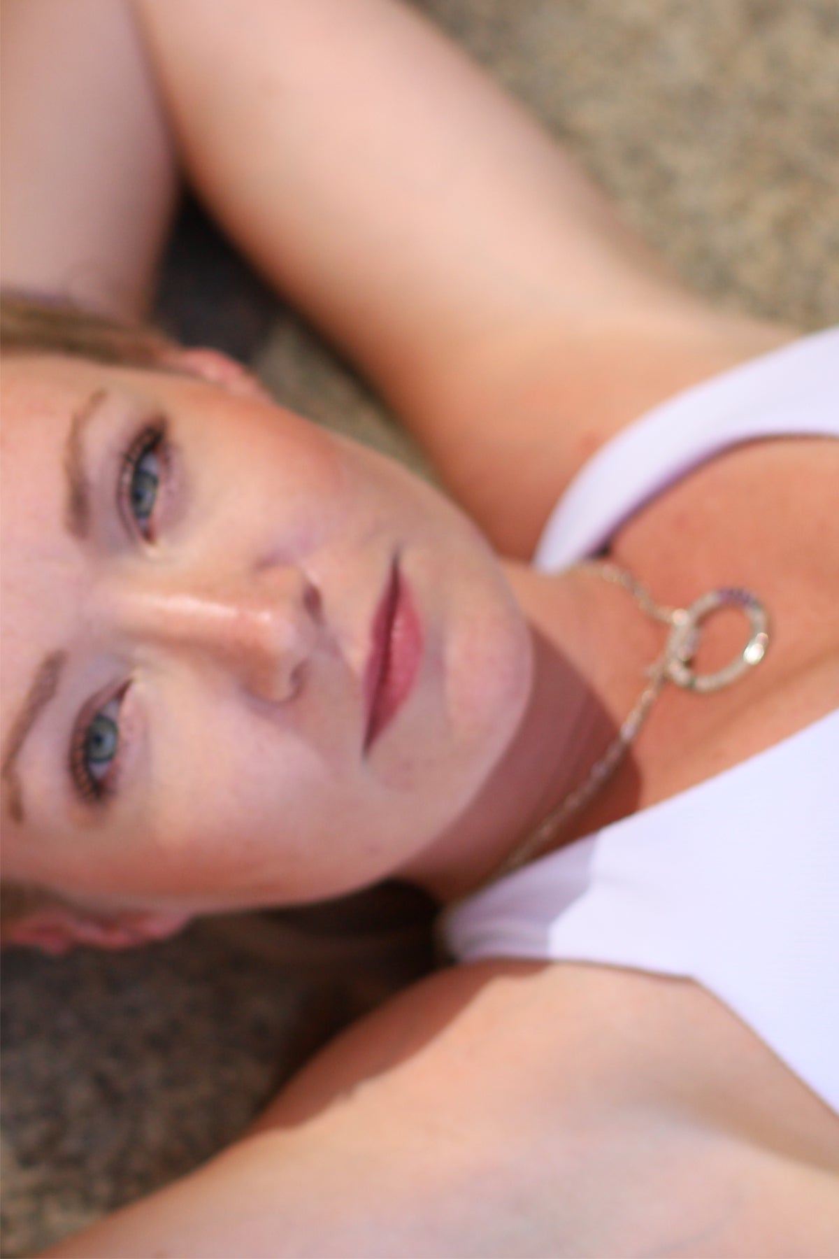 Hedi, a yoga teacher from Wiesbaden, wears a high-quality sterling silver Ganesha mantra amulet on a delicate curb chain from the Ganesha mantra jewelry collection by ETERNAL BLISS – Spiritual Jewelry.