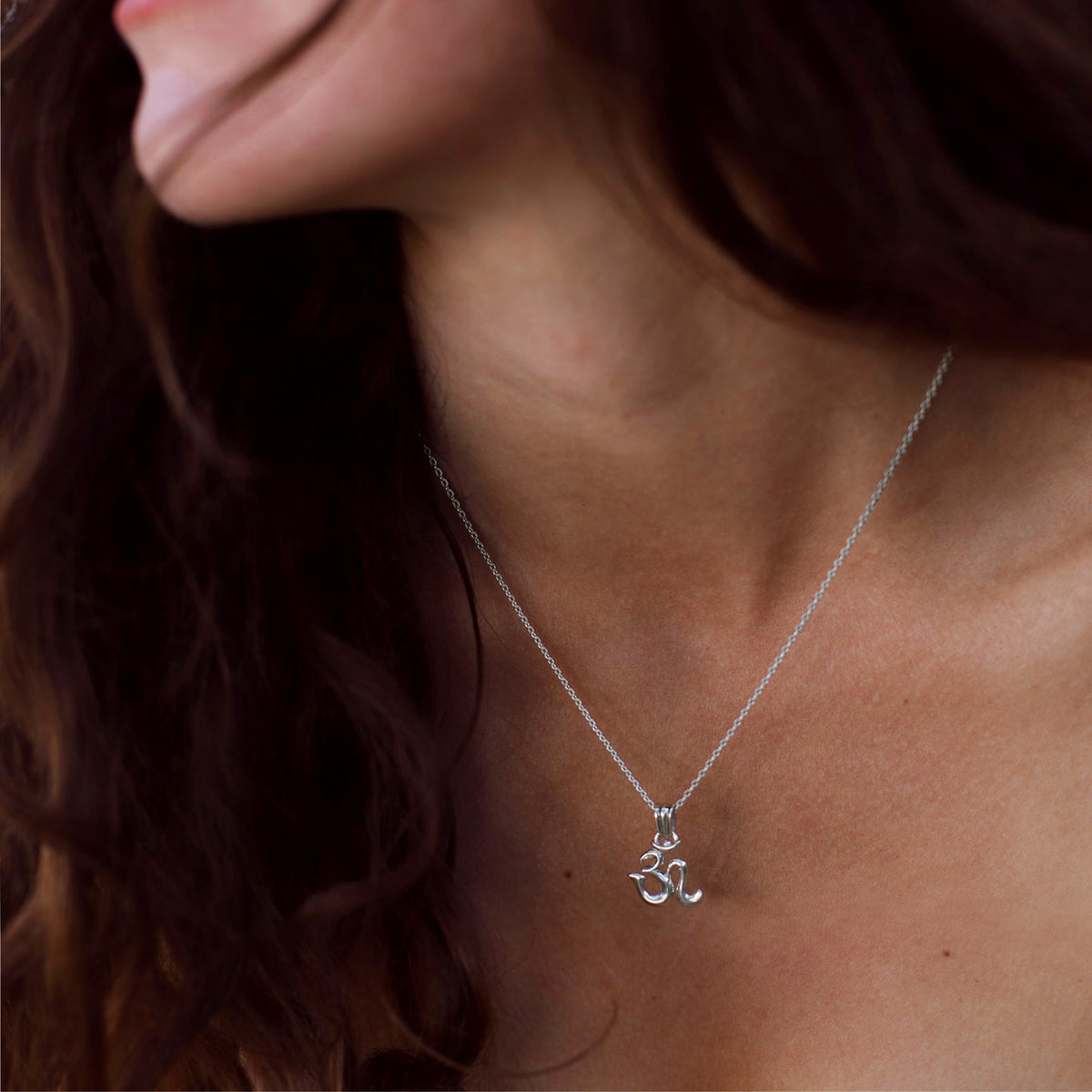 High-quality spiritual jewelry: The Om jewelry collection on the theme of connection to the cosmic being by ETERNAL BLISS