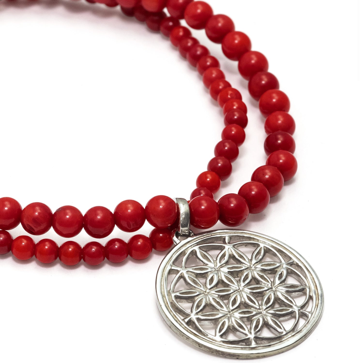 Coral bracelet with flower of life amulet made of sterling silver