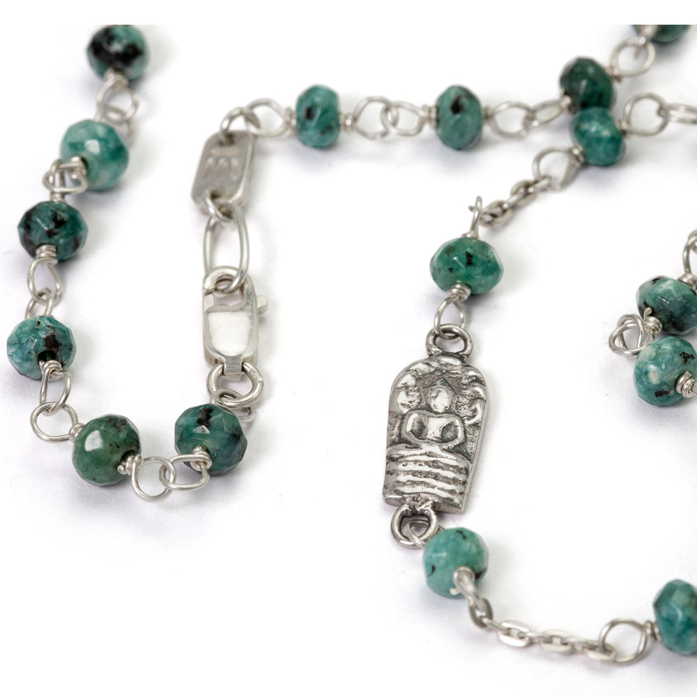Gemstone necklace with jade beads and Buddha emblems made of high-quality sterling silver by Eternal Bliss