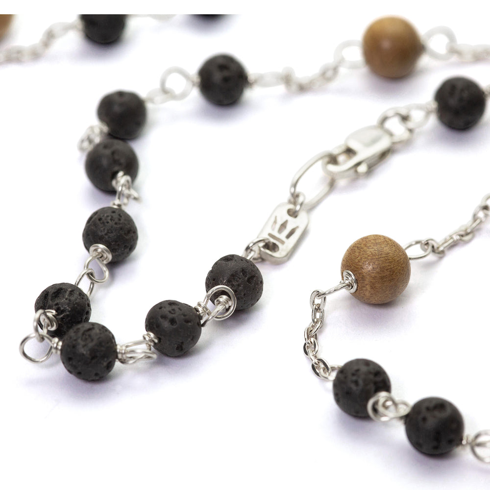 Creation and Growth necklace in sterling silver with lava and sandalwood beads by Eternal Bliss