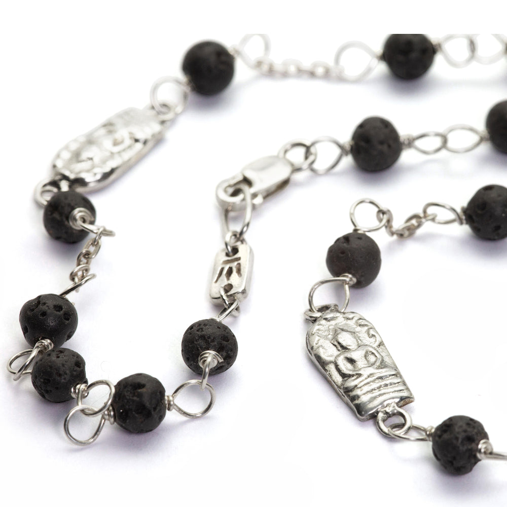 Sterling silver "Concentration" necklace with lava beads and Buddha amulets by Eternal Bliss