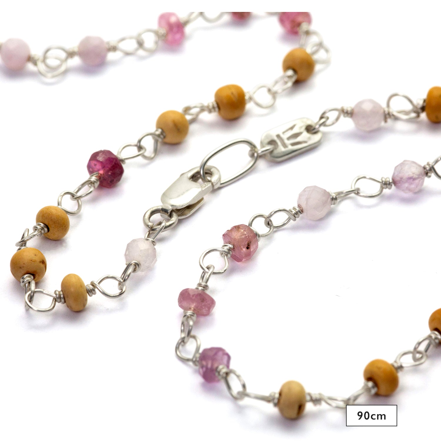 Detail of gemstone necklace "Sakura" made of high-quality sterling silver with ruby, rock crystal, lavender, and sandalwood by Eternal Bliss
