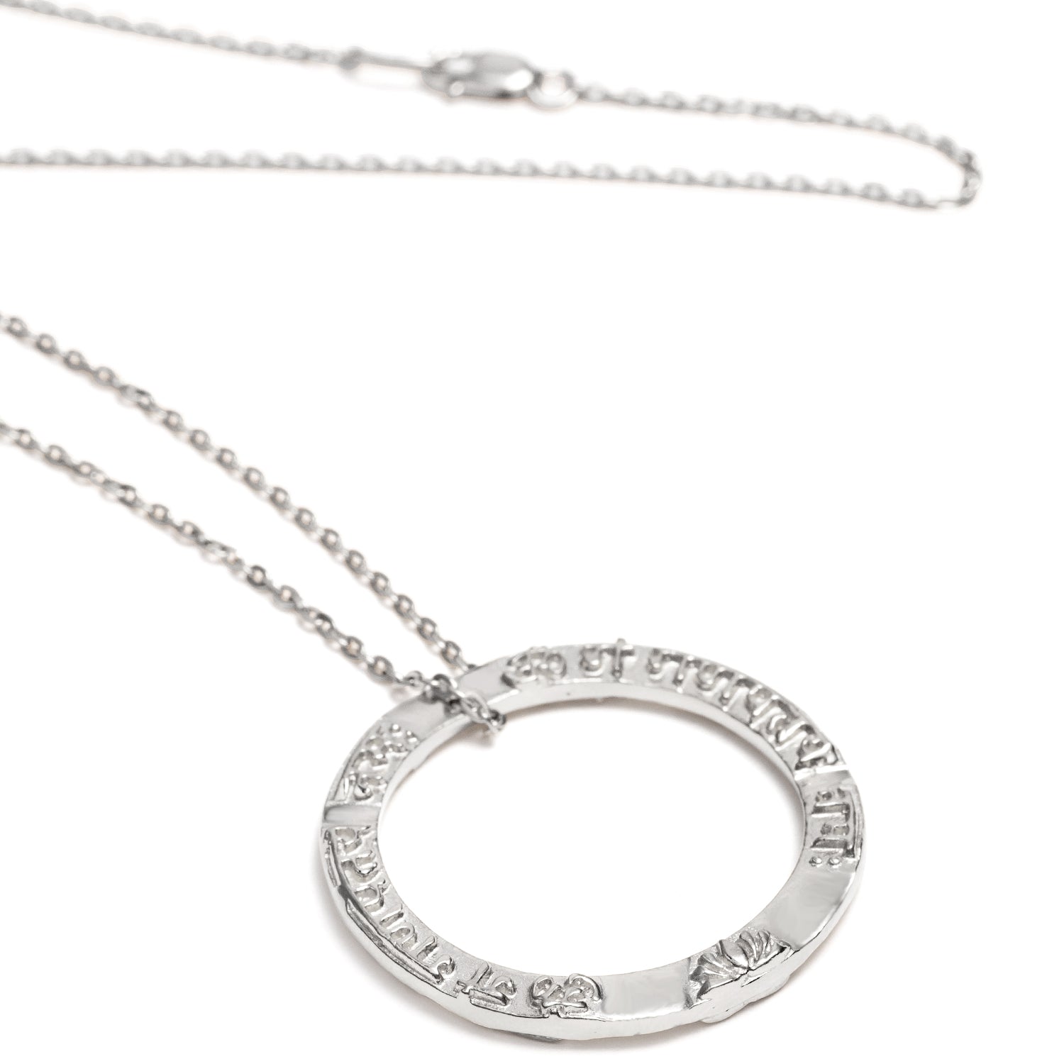 Ring shaped Ganesha Mantra pendant in sterling silver from ETERNAL BLISS from the spiritual yoga jewelry collection