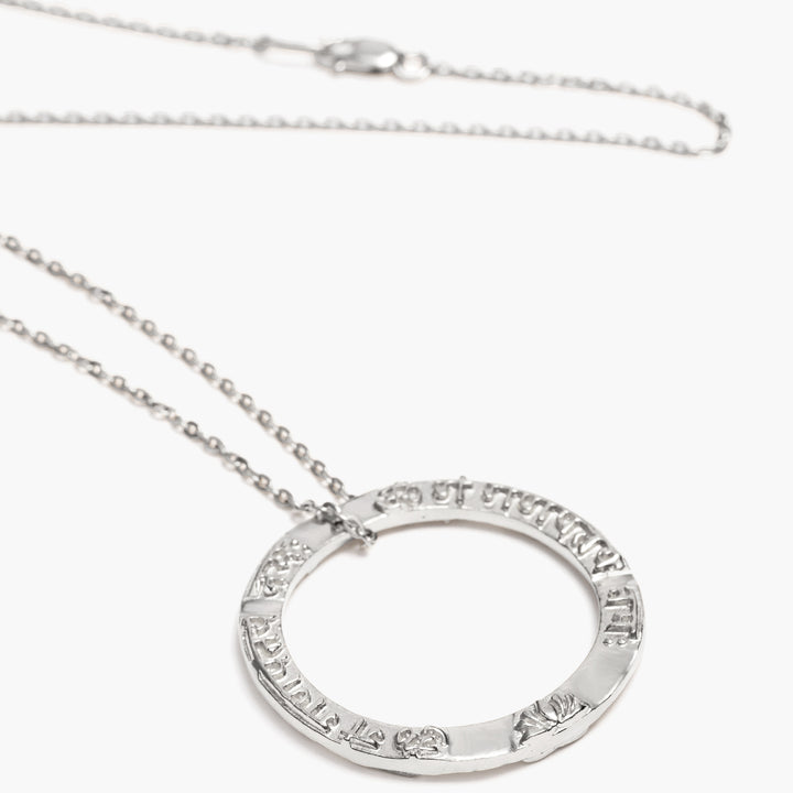 Ring shaped Ganesha Mantra pendant in sterling silver from ETERNAL BLISS from the spiritual yoga jewelry collection