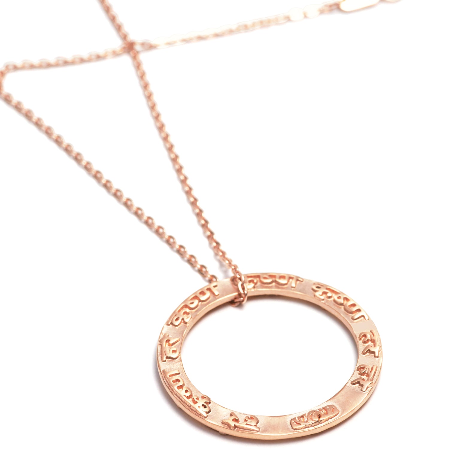 Krishna mantra pendant made of sterling silver rose gold plated by Eternal Bliss