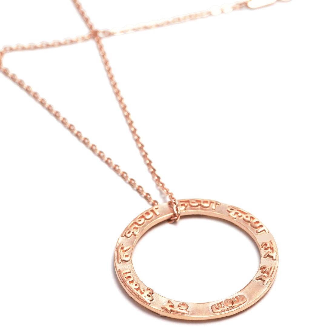 Krishna mantra pendant made of sterling silver rose gold plated by Eternal Bliss