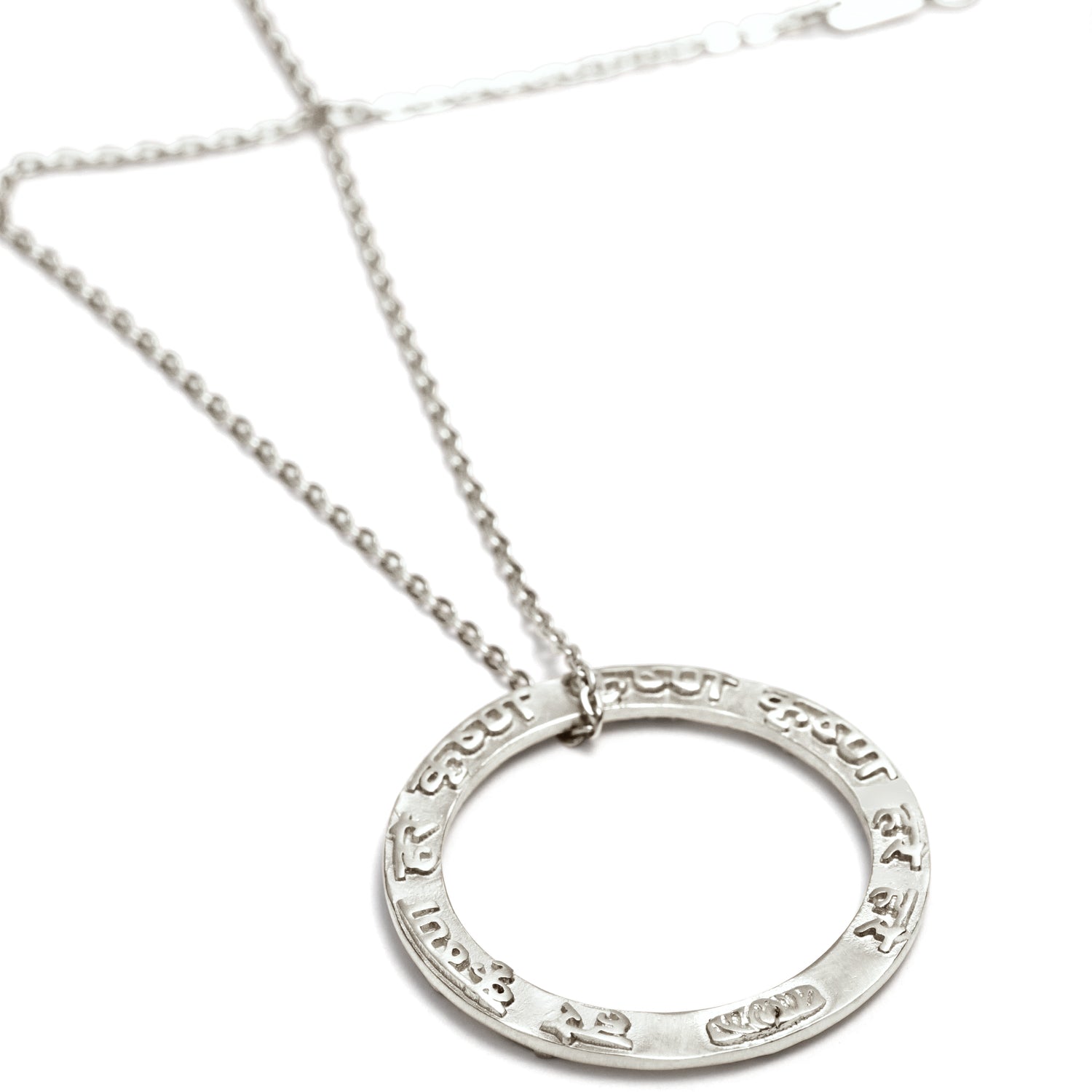 Krishna mantra pendant made of sterling silver with a high-quality silver chain from ETERNAL BLISS