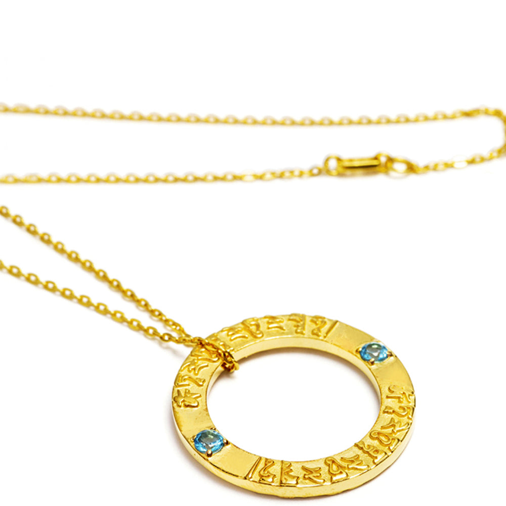 Tara mantra pendant made of high-quality gold-plated sterling silver with topaz gemstones by ETERNAL BLISS from the Spiritual Yoga jewelry collection